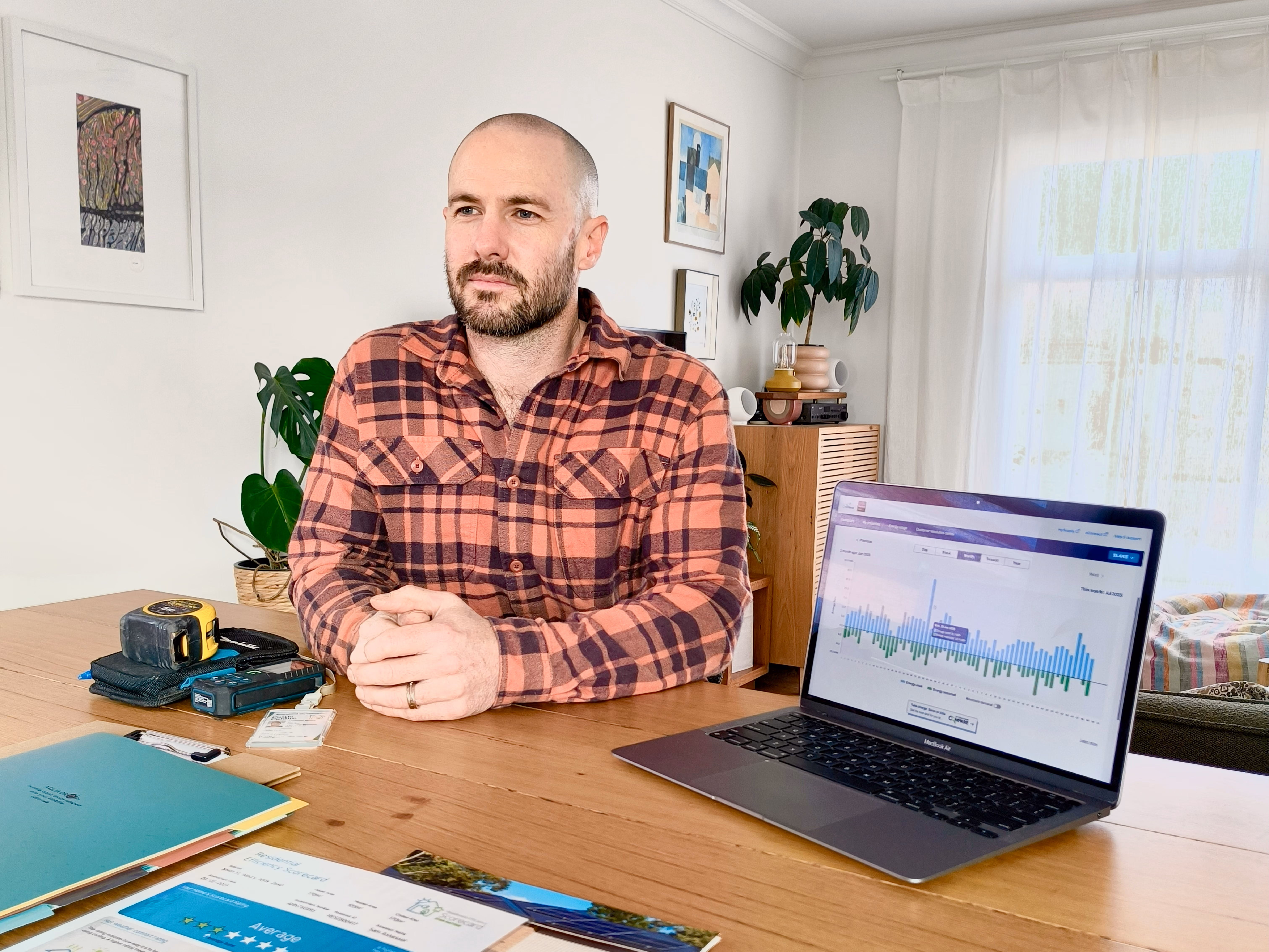 photo showing an energy assessor presenting to a client